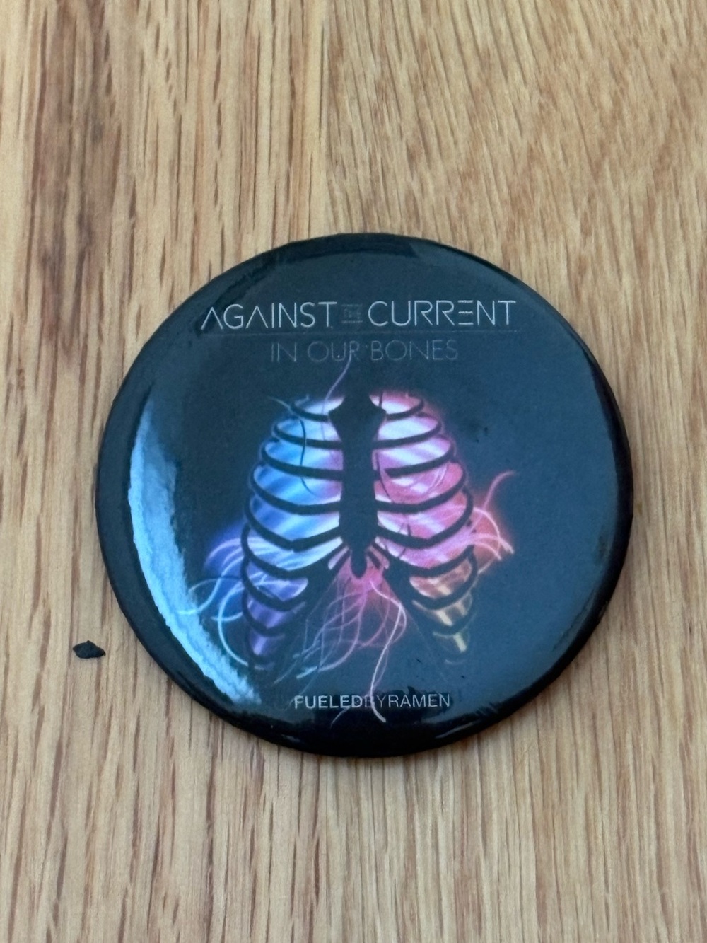 Against The Current band logo pin for album In Our Bones